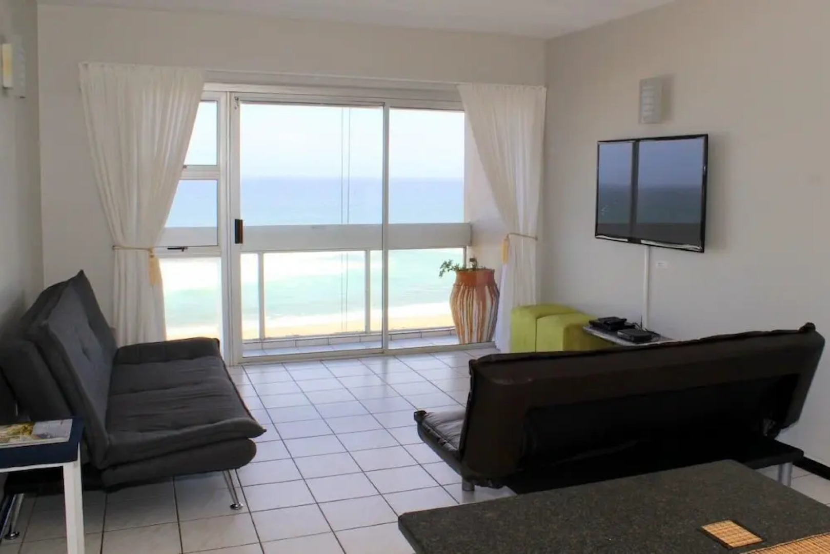 A Breath-taking 180 Degree Beach View Right From Your bed or Lounge