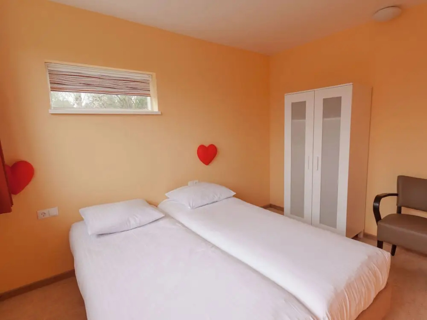 Cozy decorated house with fireplace, surrounded by forest