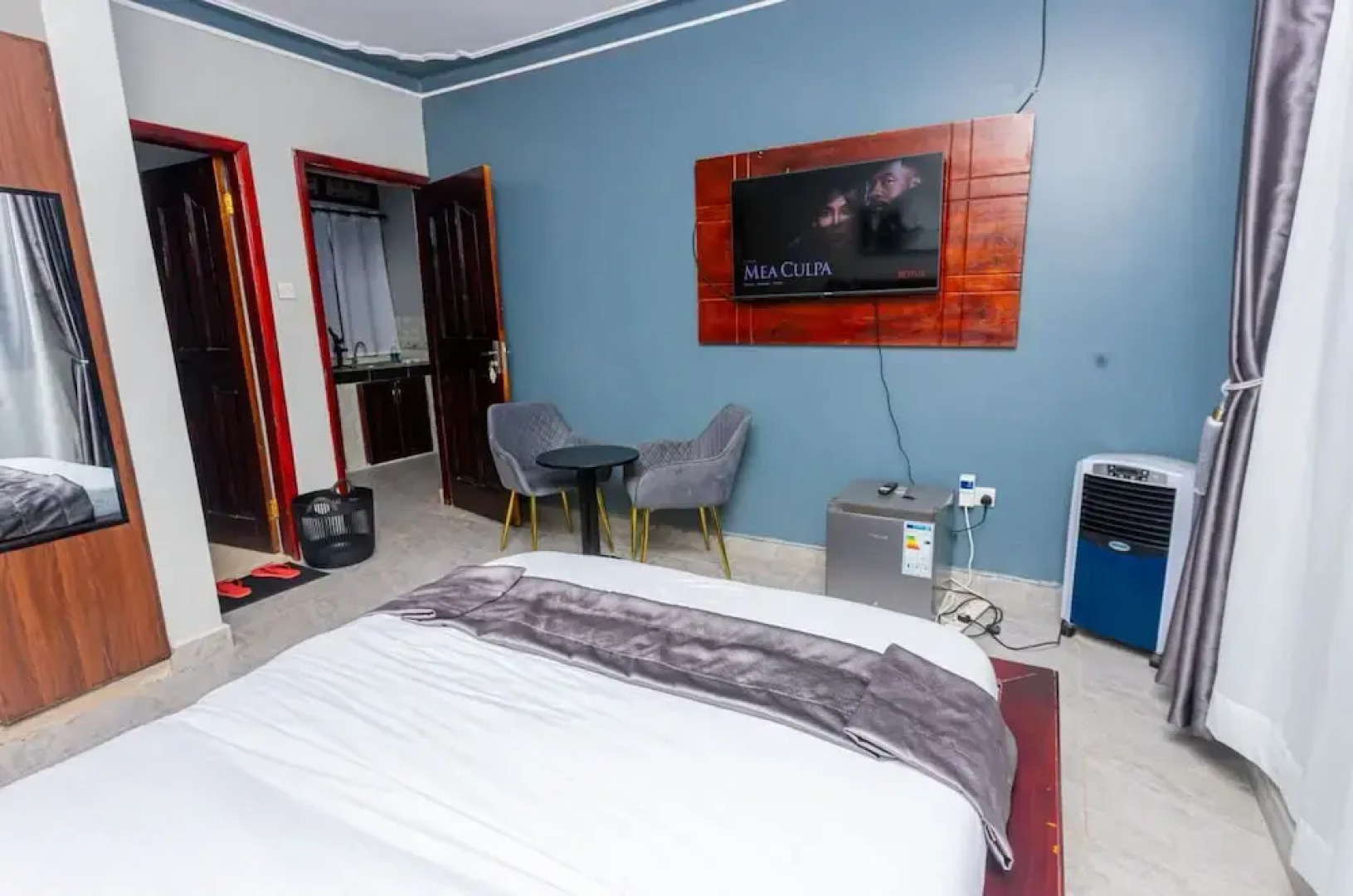 The Den Soroti White