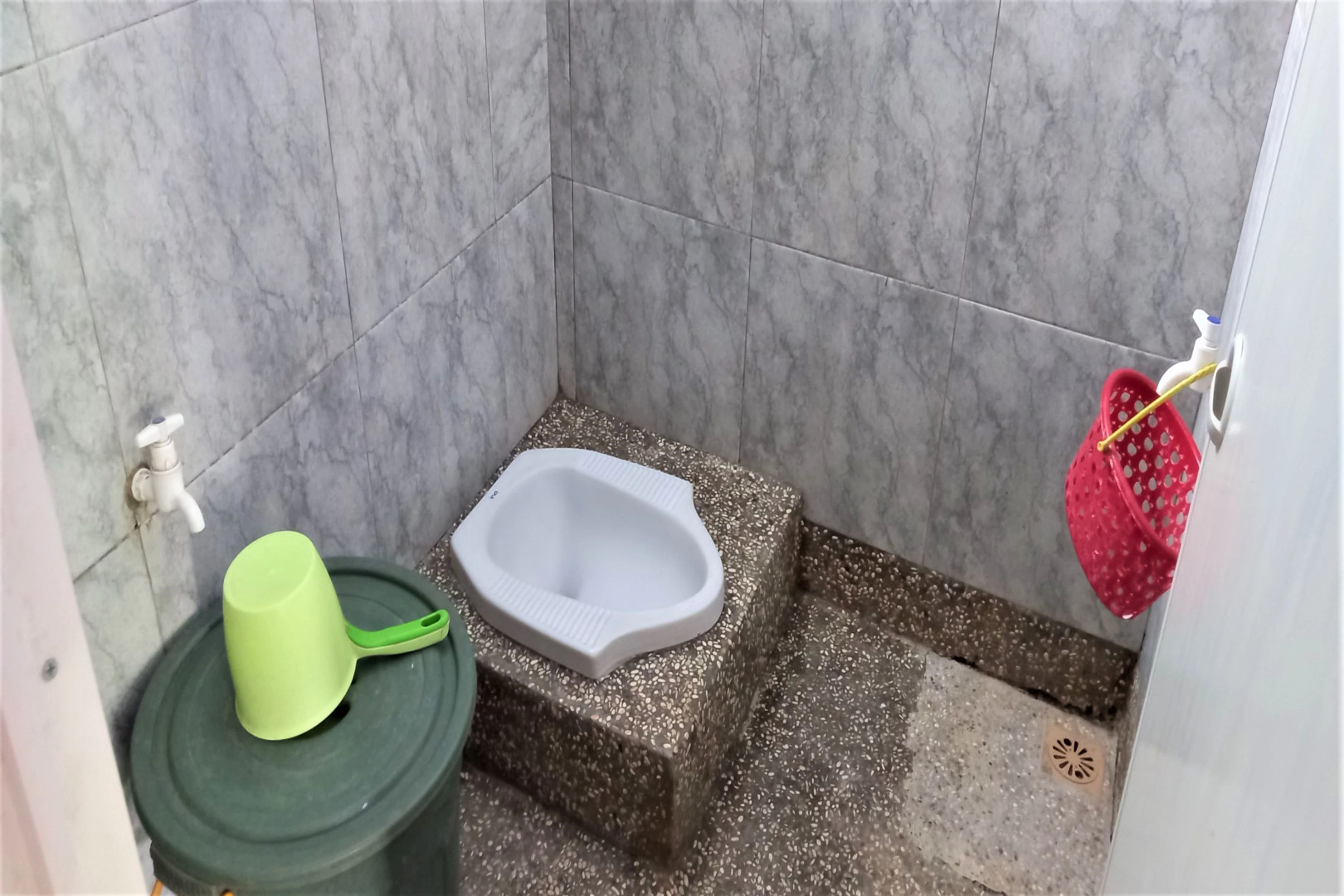 Nabila Syar i Guesthouse by ZUZU