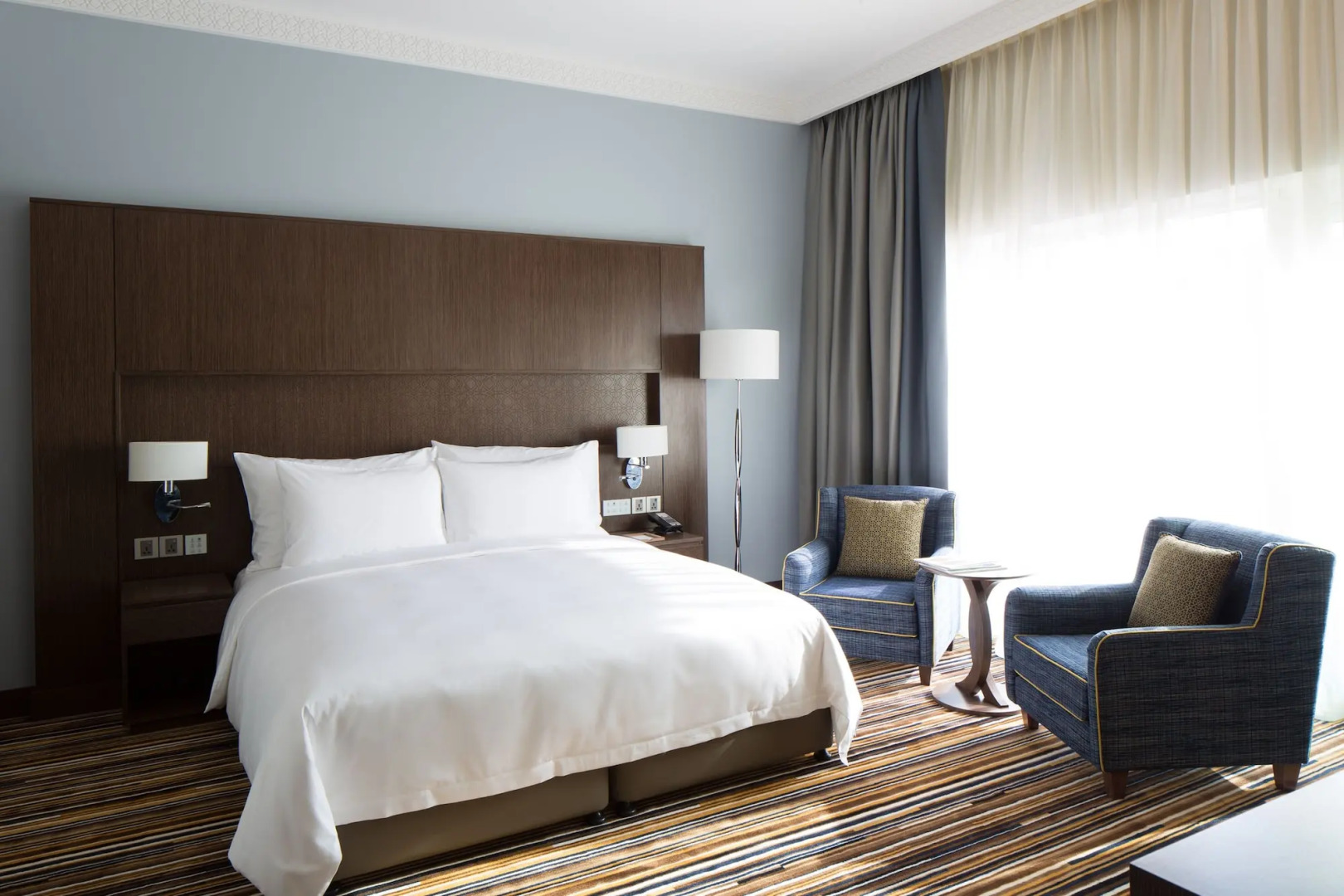 Отель Naumi Dubai