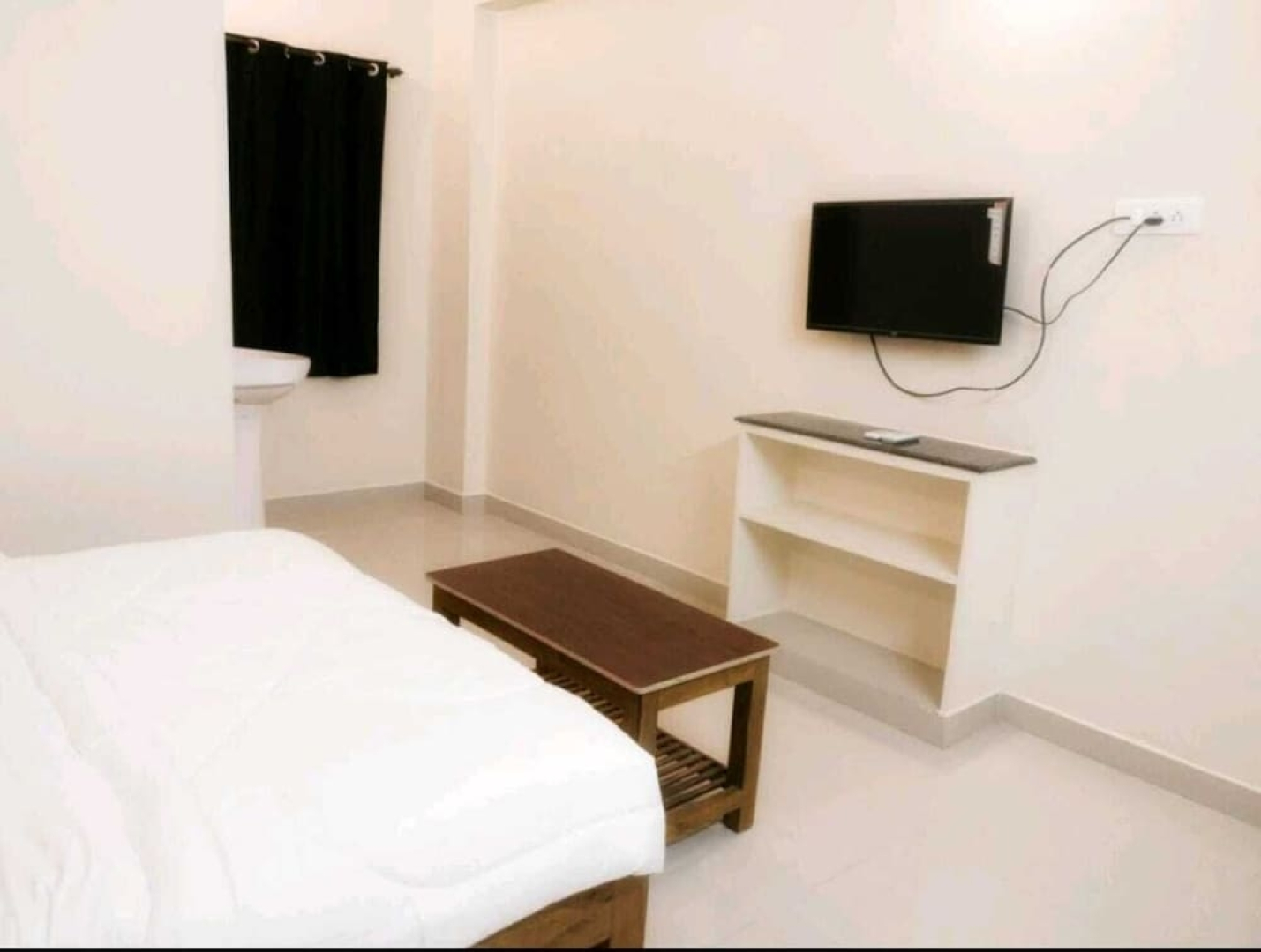 Iroomz Hotel Krishna Inn