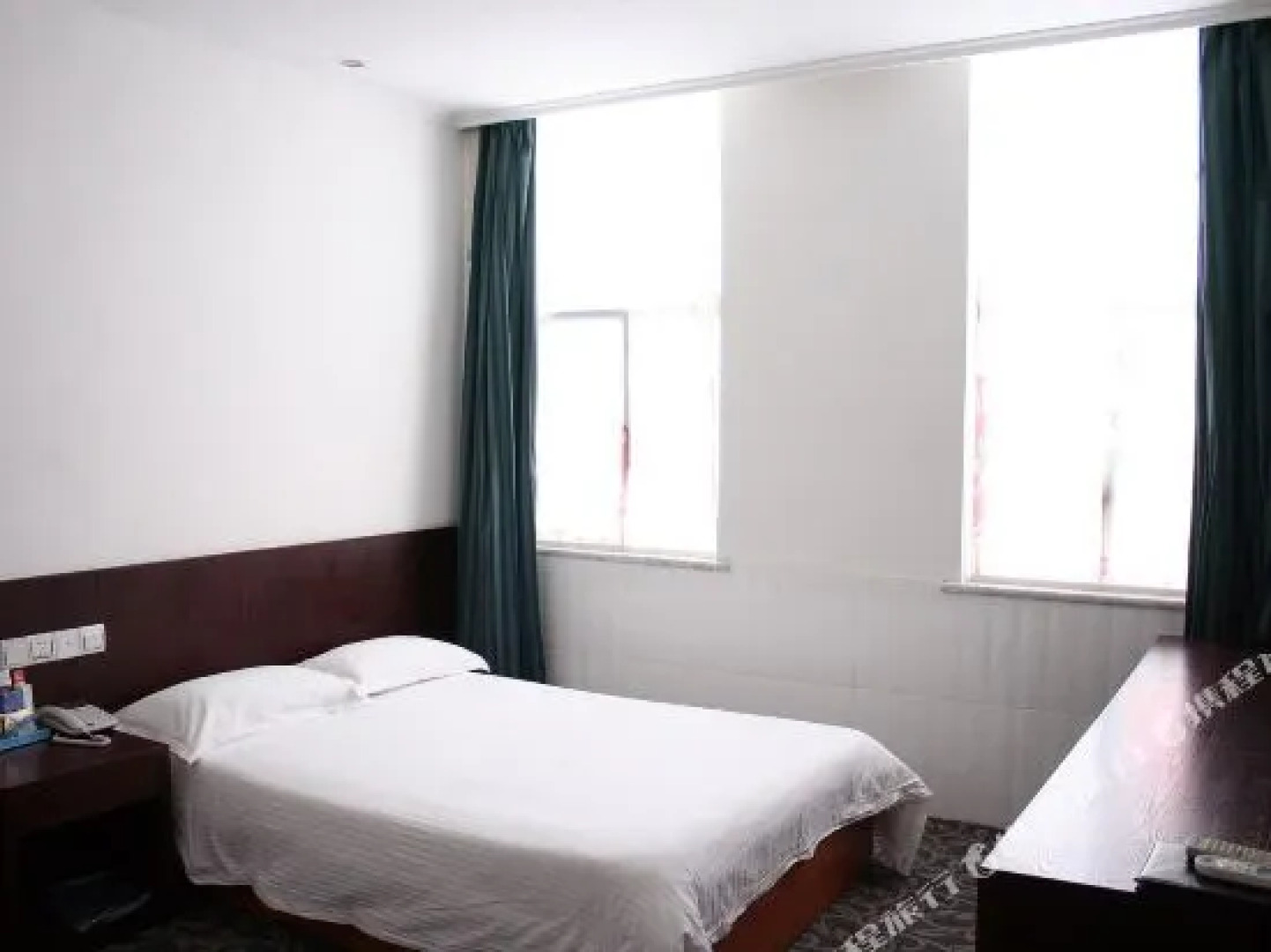 Jining Qinghua Hotel