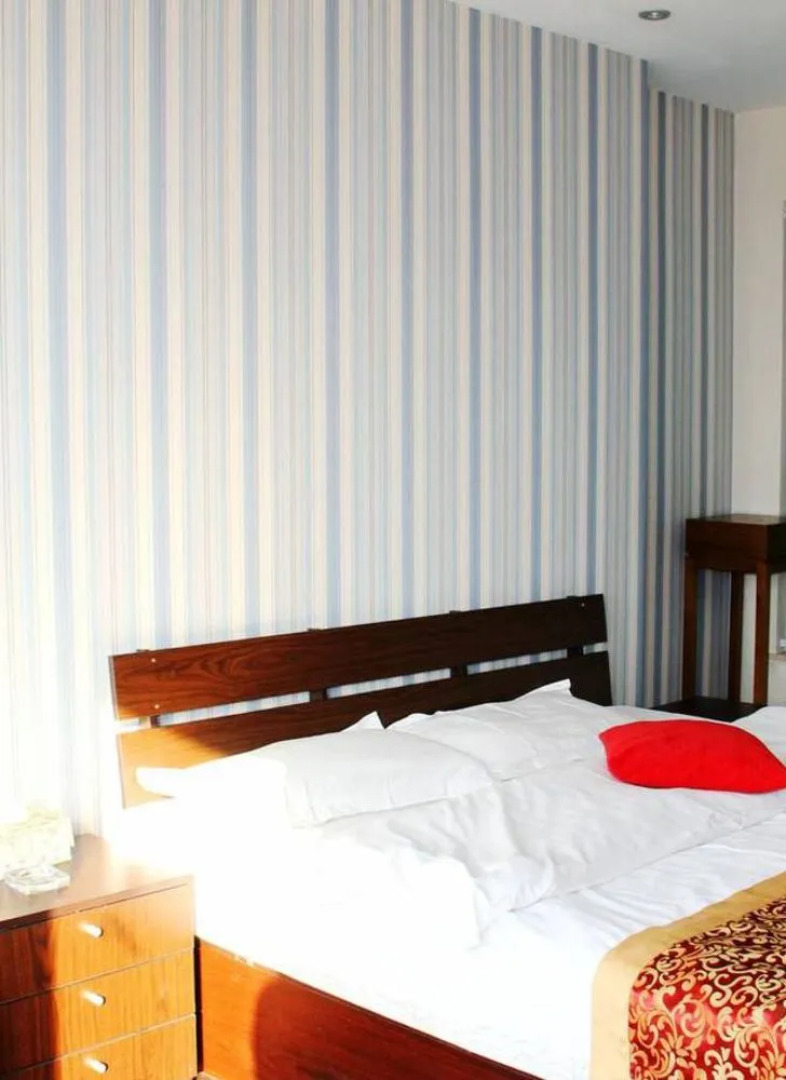 Enji Apartment Hotel Bainianhui - Dalian