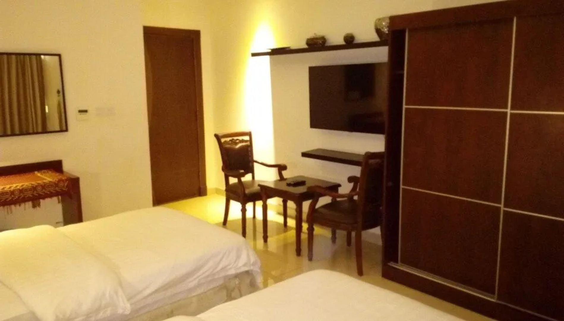 Romooz Inn Hotel Suites