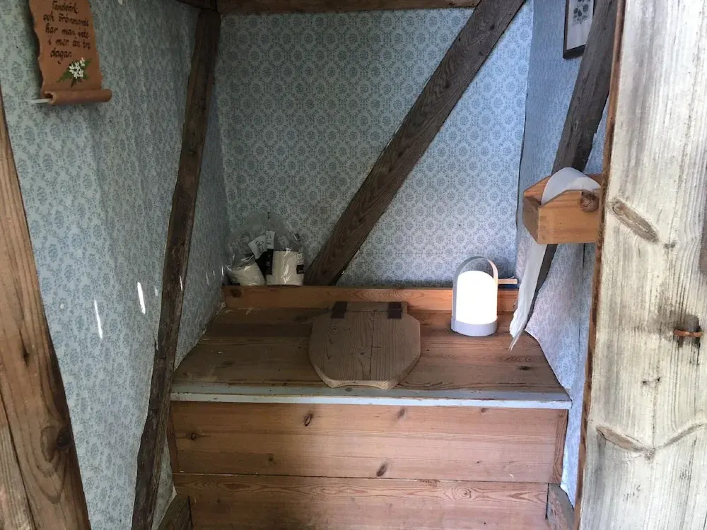 Tiny hut in the Forest Overlooking the River