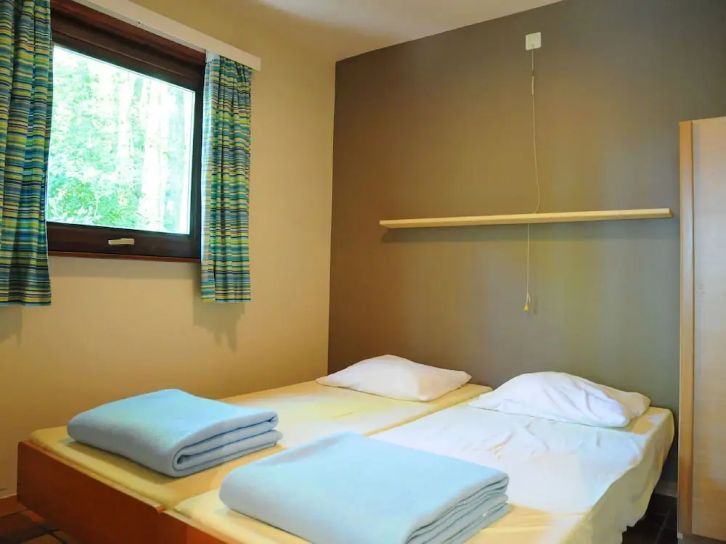 Wooden Chalet With Stove and Microwave Located in the Forest