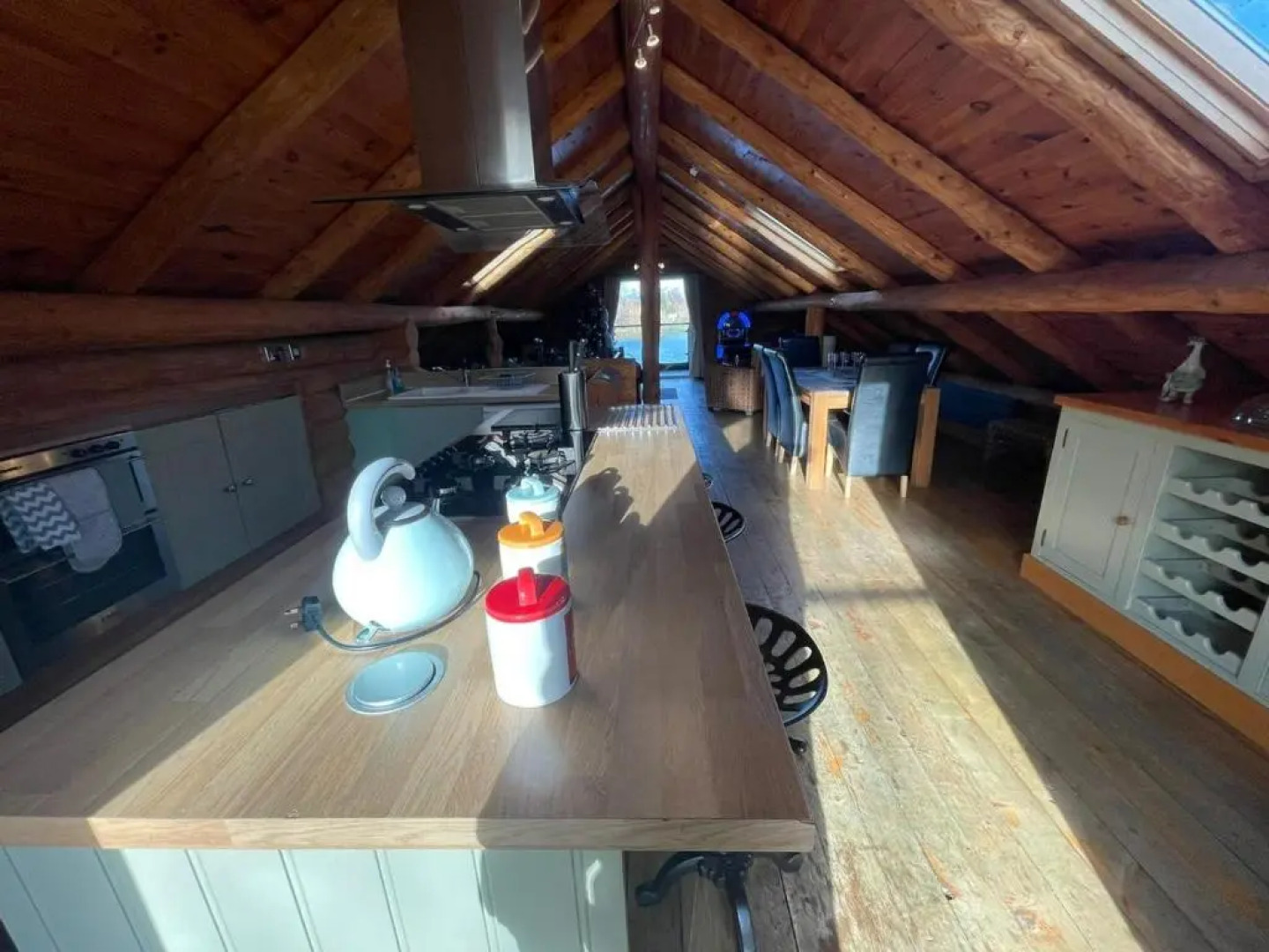 Woodpecker Log Cabin with hot tub, pizza oven bbq entertainment area, lakeside with private fishing peg situated at Tattershall Lakes