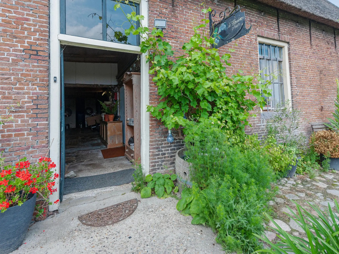 Farmhouse by Lauwers River With Rowing Boat