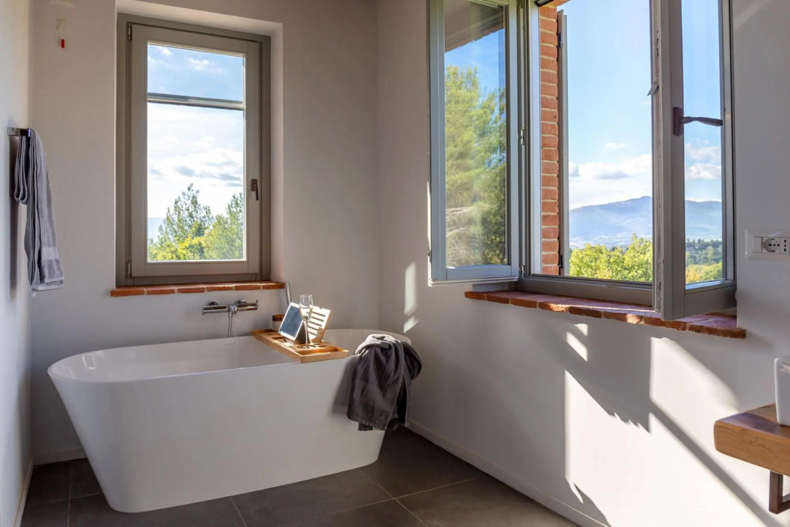 In an enchanting position, located on a hill, Podere Calcina is a recently completely renovated farm-Podere Calcina