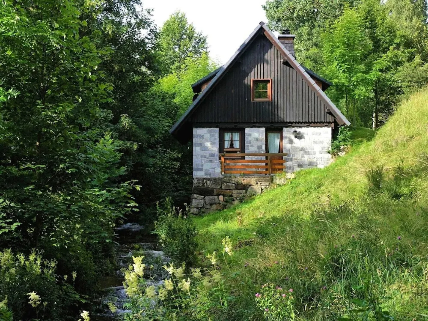 Detached mill by a rippling brook