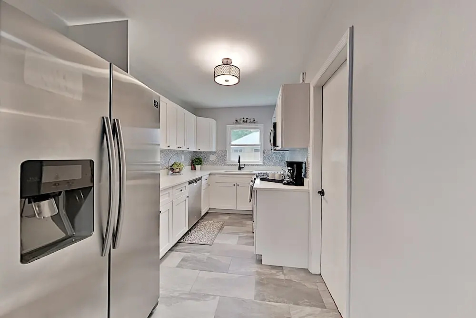 Charming Getaway W/ New Kitchen & Private Backyard 3 Bedroom Home