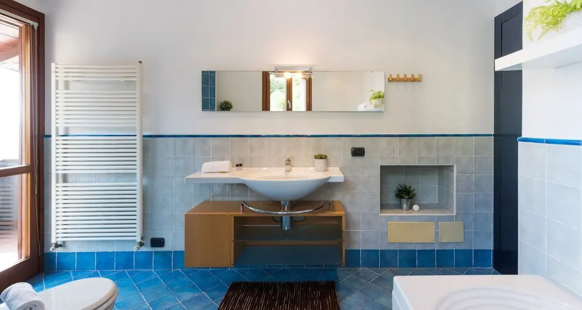 JOIVY Scenic 2BR Apt w/ Balcony & Parking