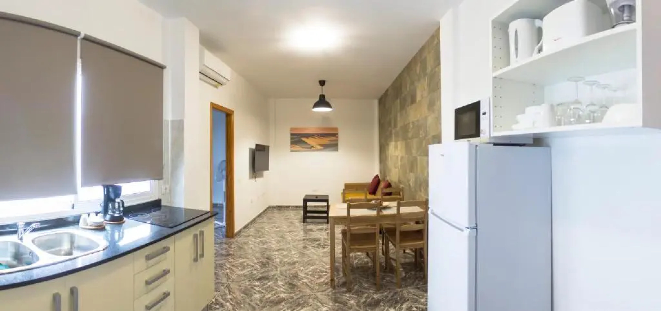 Apartamentos La Aldea Suites