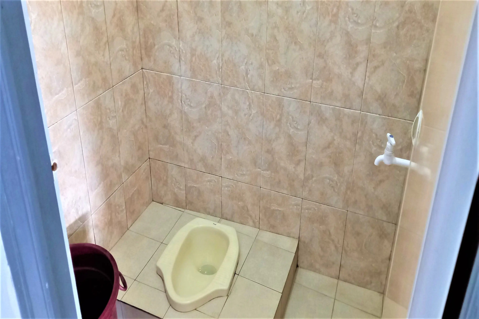 Nabila Syar i Guesthouse by ZUZU