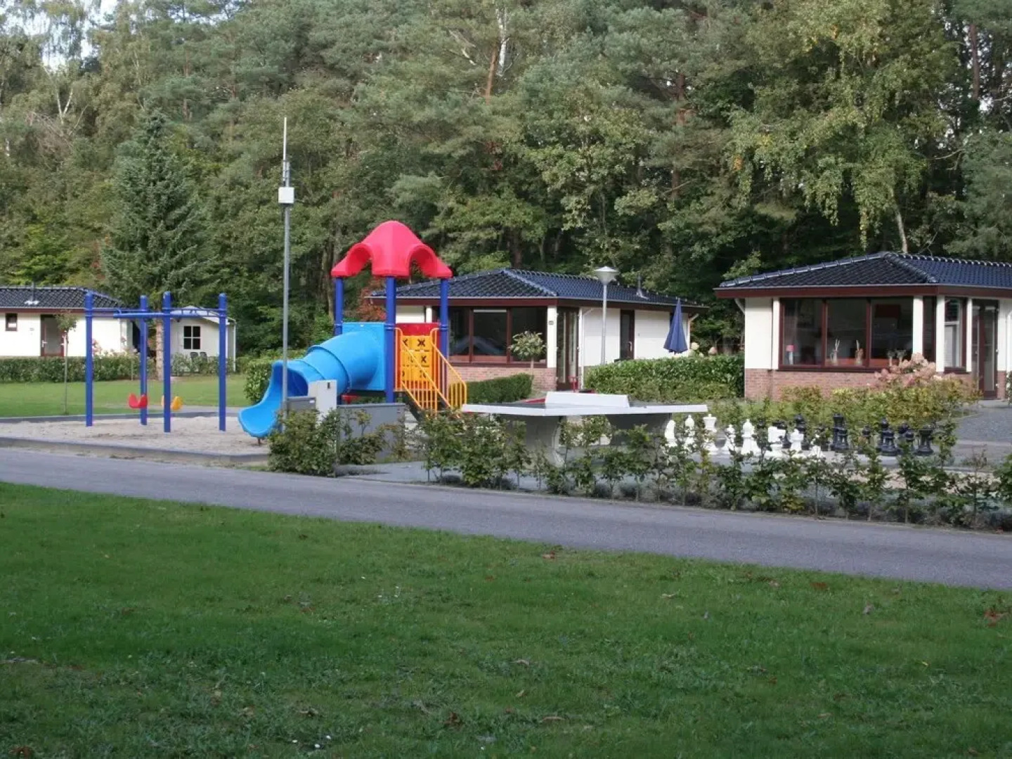 Modern chalet with a dishwasher, near a pond