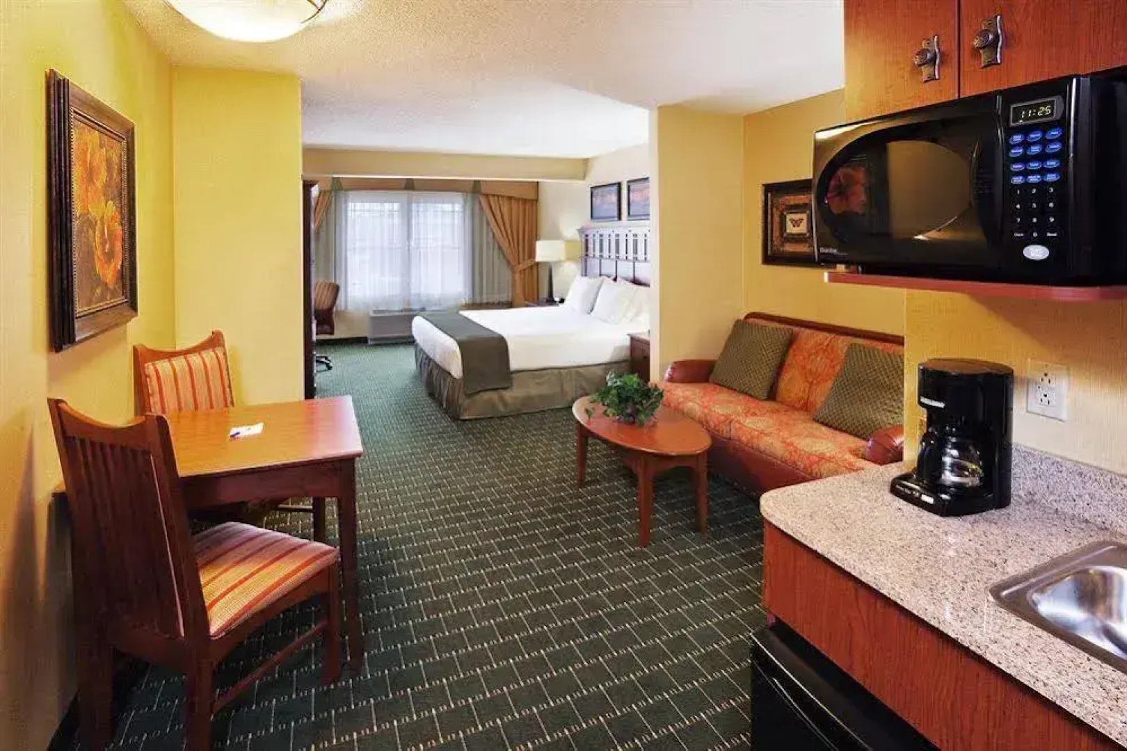 The Q Hotel And Suites