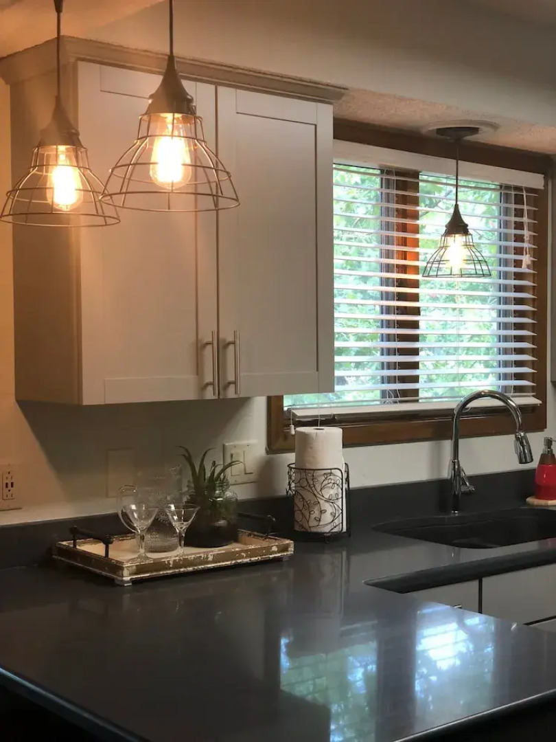 Forest view, log-sided two bedroom, two bath condo on Lake Ouachita. by RedAwning