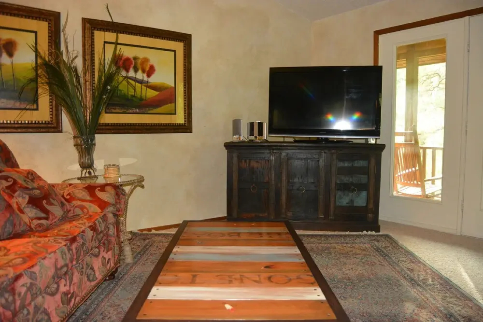 Forest view, log-sided two bedroom, two bath condo on Lake Ouachita. by RedAwning