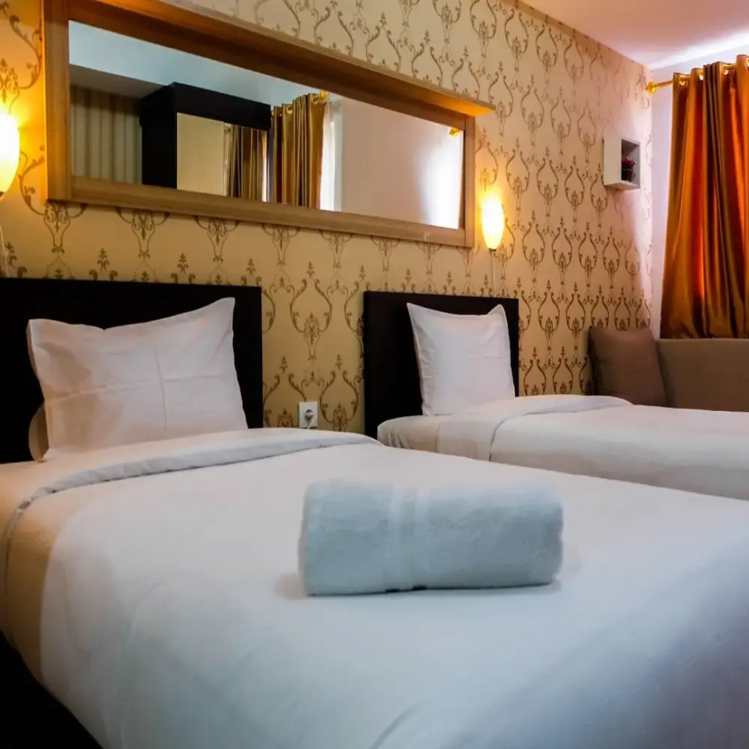 Minimalist and Comfy Studio The Oasis Cikarang Apartment By Travelio