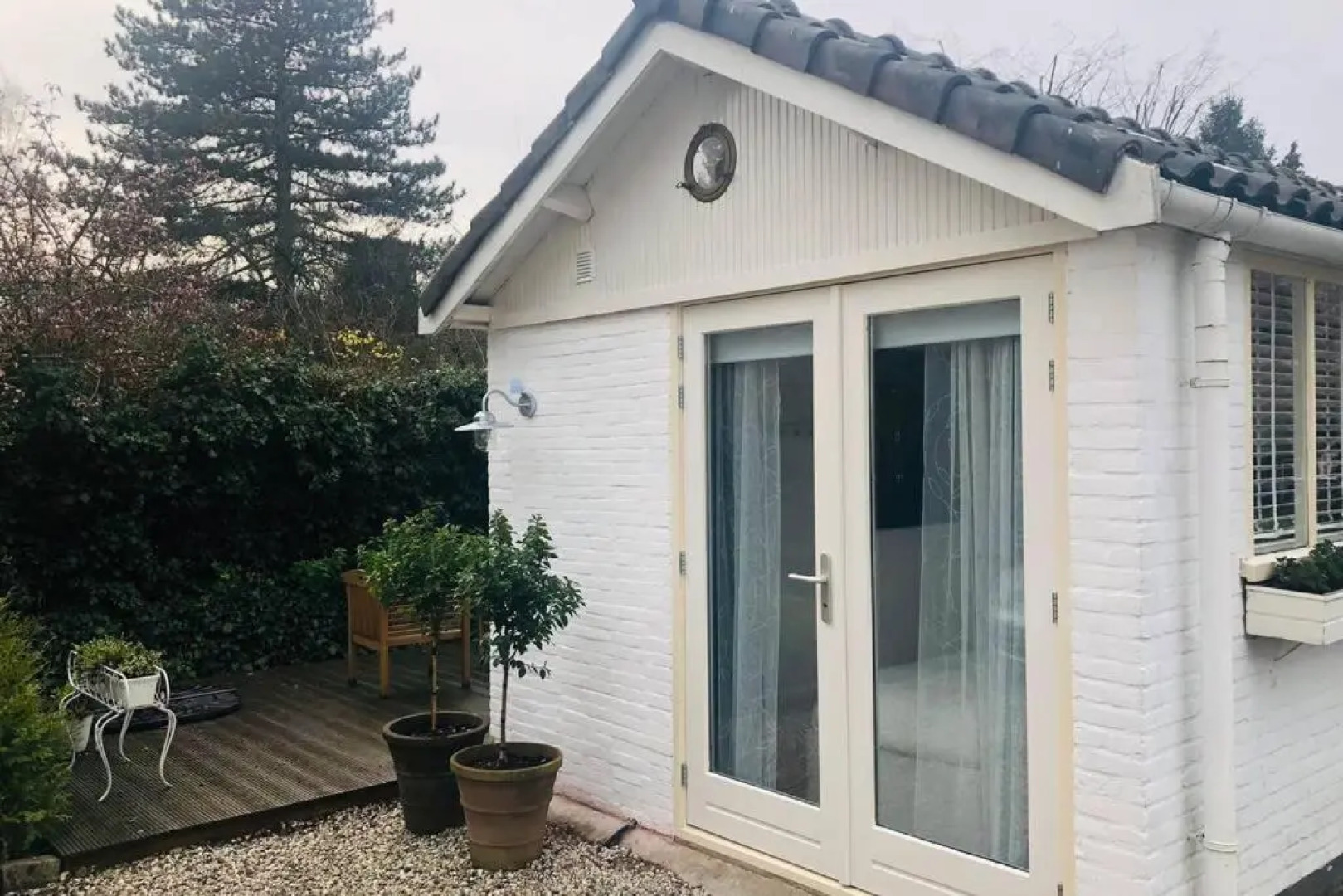 Tiny house in tuin van de statige villa Mariahof