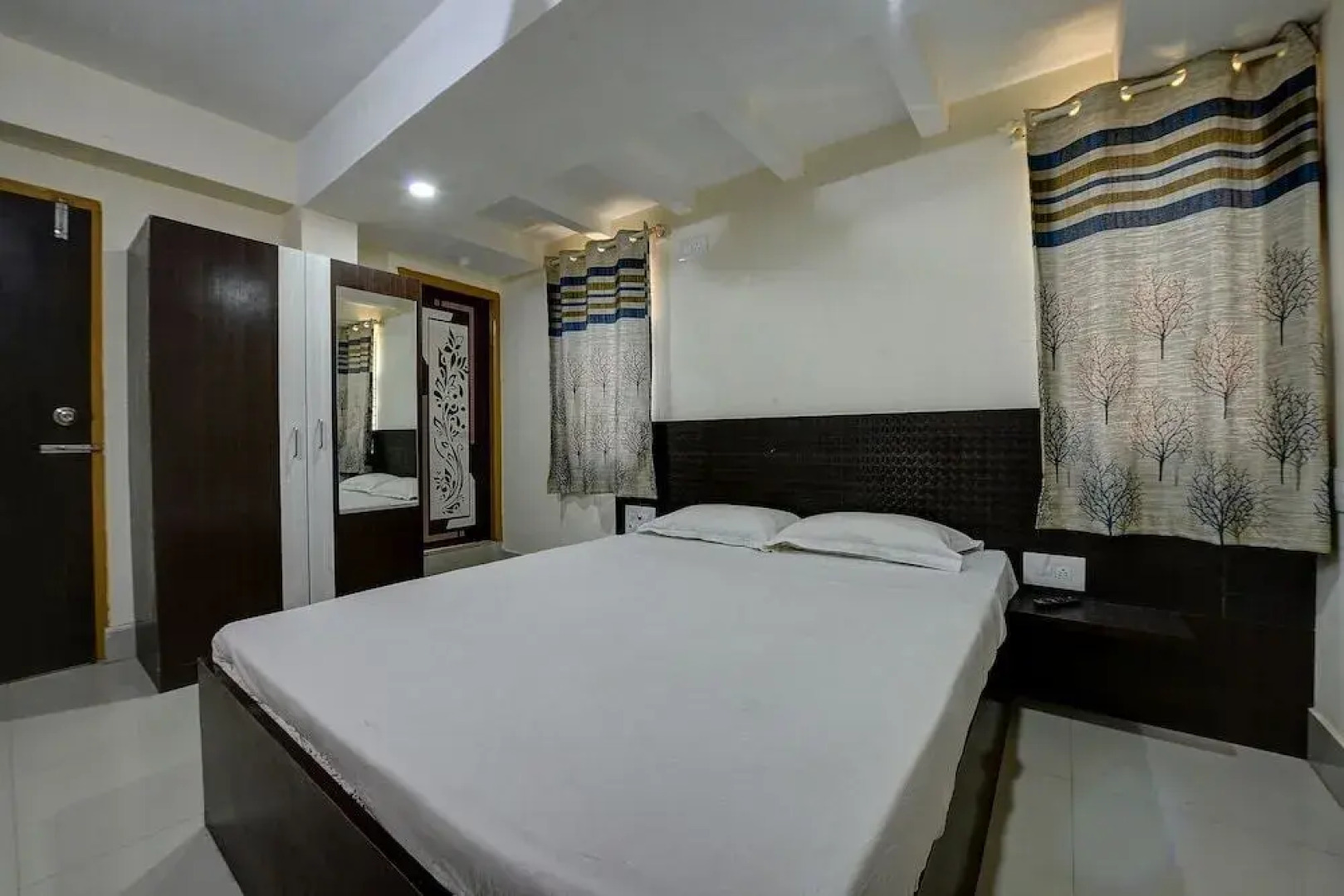 SPOT ON 37153 Karavali Paradise