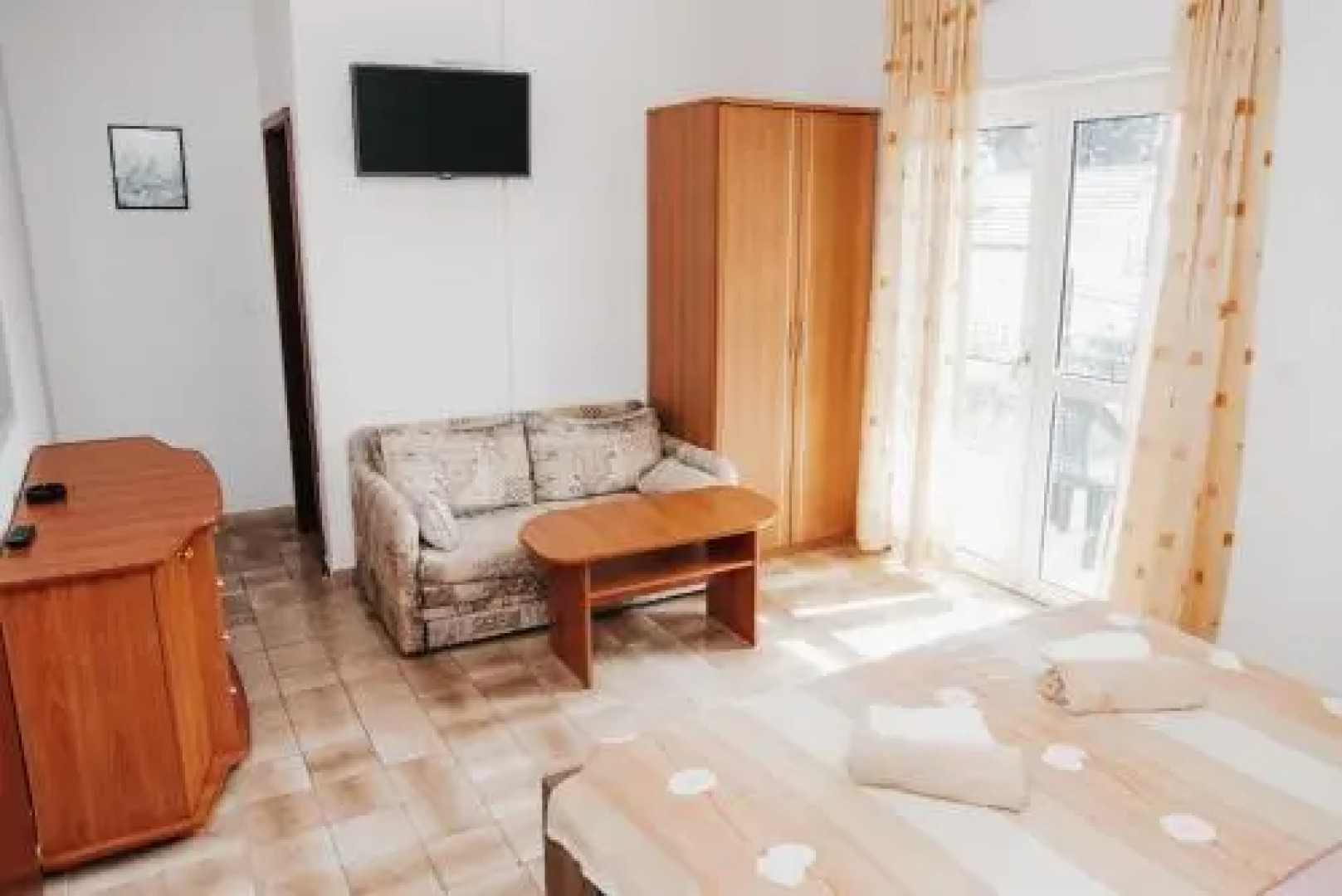 Apartments and Rooms Maganic