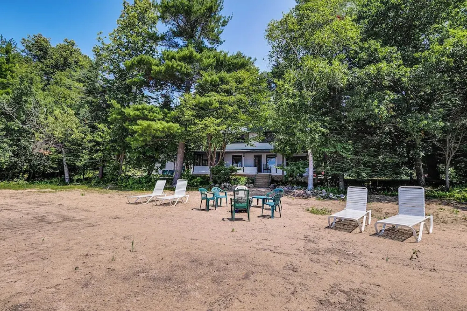 Torch Lake Getaway w/ Private Beach + Boat Dock!