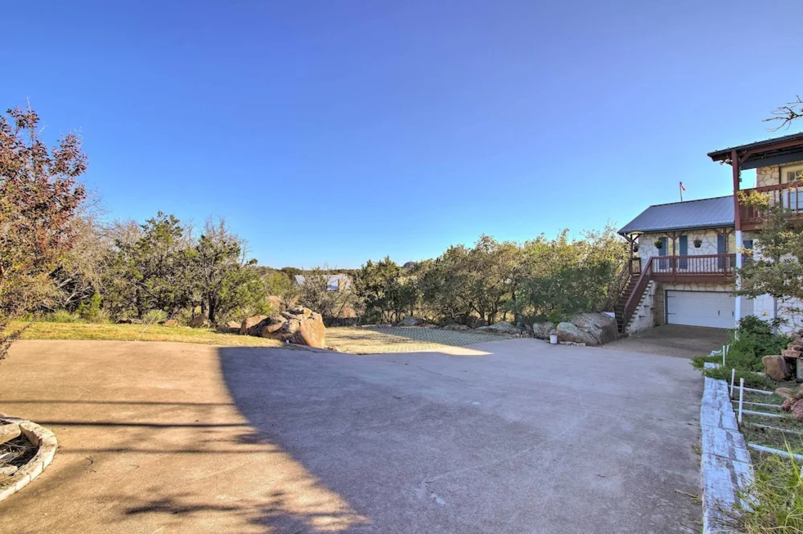 Sunny Lakefront Escape w/ Private Beach & Deck