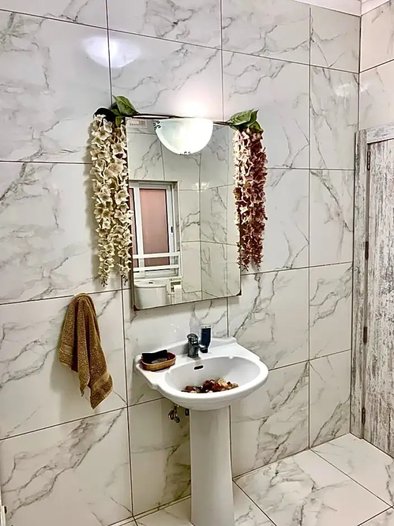 Private bedroom with balcony in a shared apartment at the Bay of Xlendi