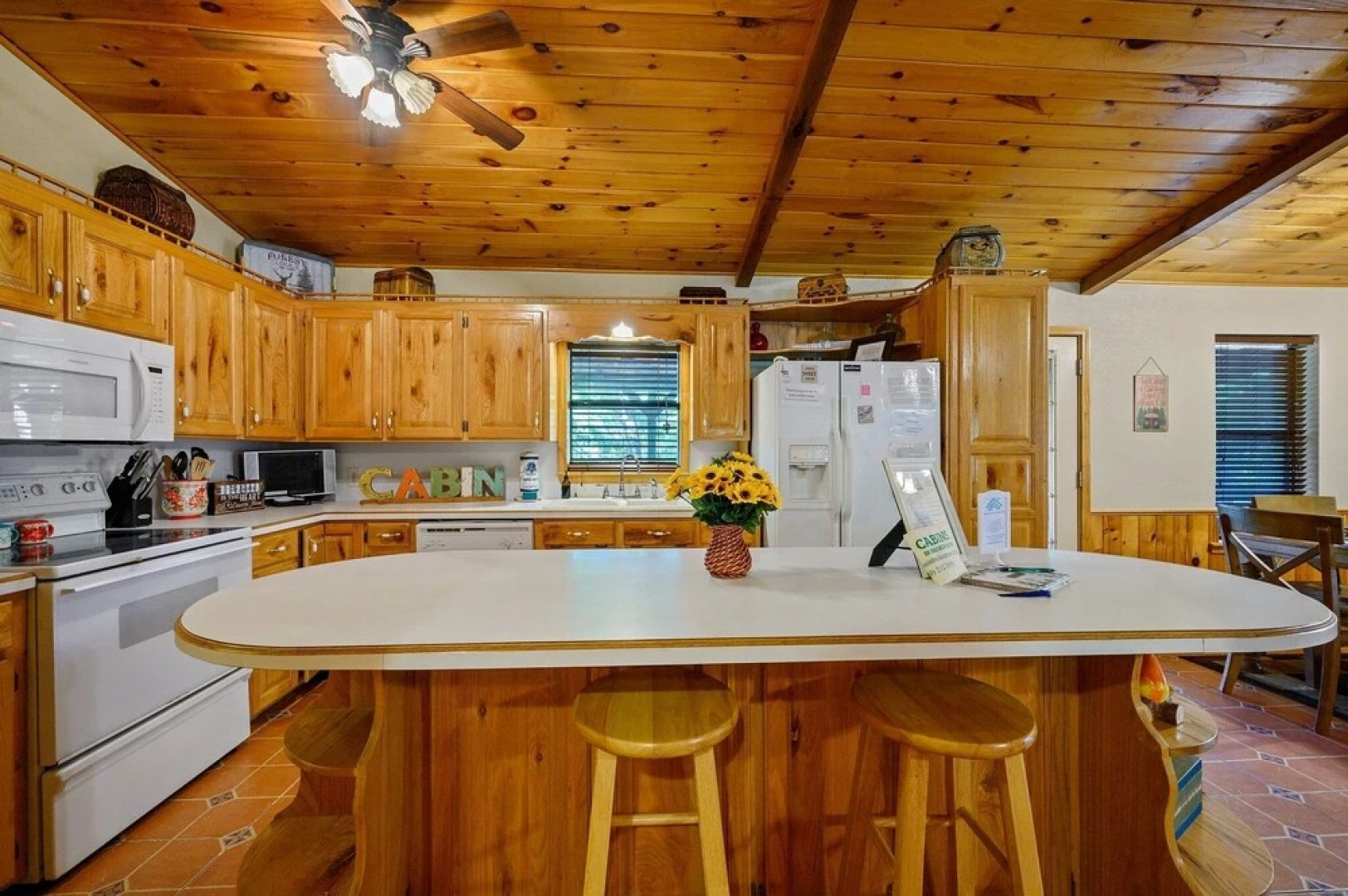 Cast Away Family Cabin with Hot Tub, Fireplace, and Kids Area by RedAwning