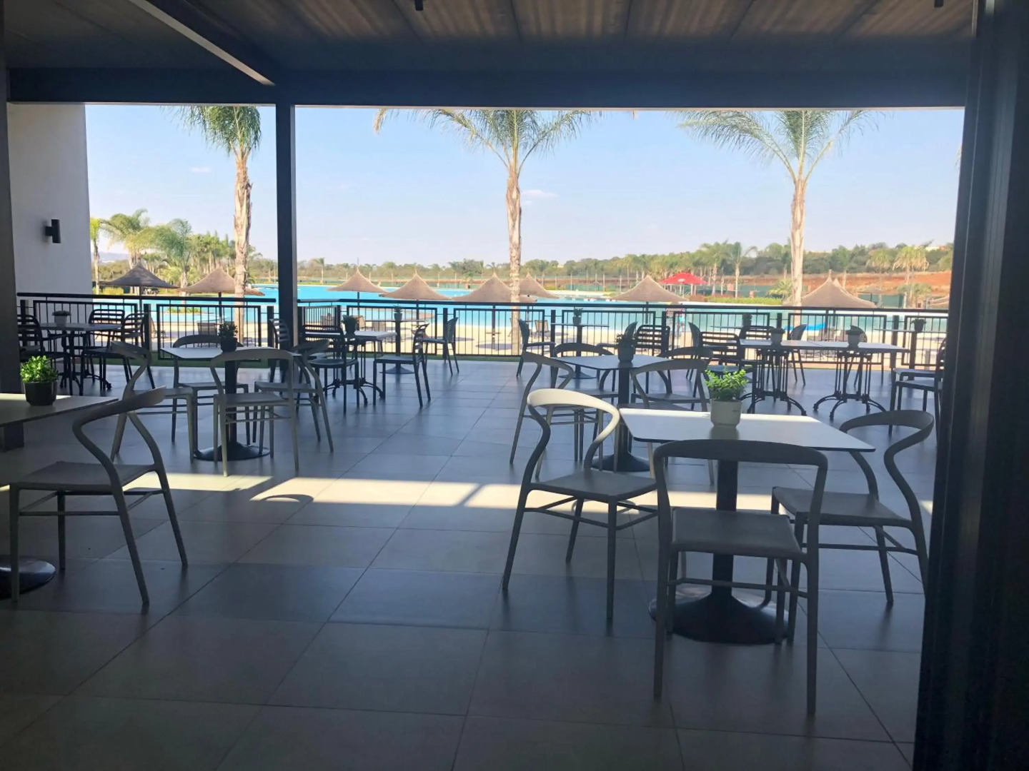 A Coastal/island experience at a Large 2 bed apartment at a Crystal Lagoon Estate.