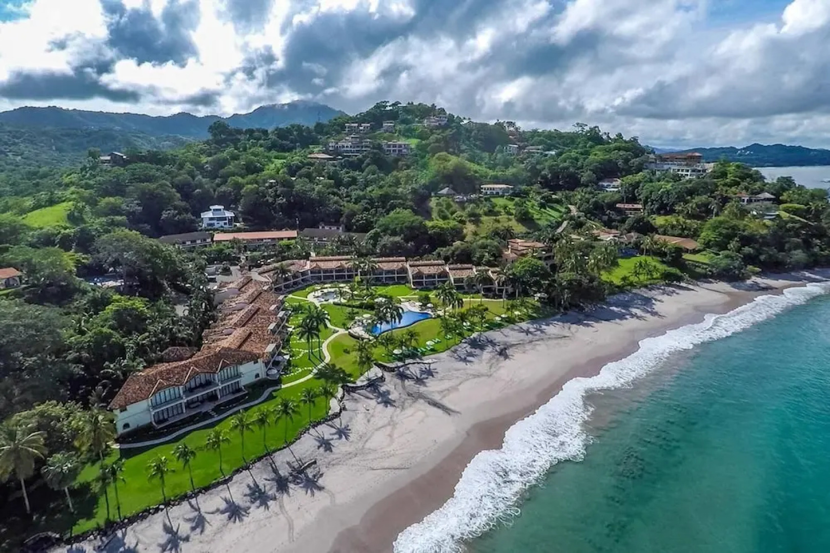 Spacious Open-Concept Condo with Stylish Design, Direct Beach Access & Resort-Style Amenities