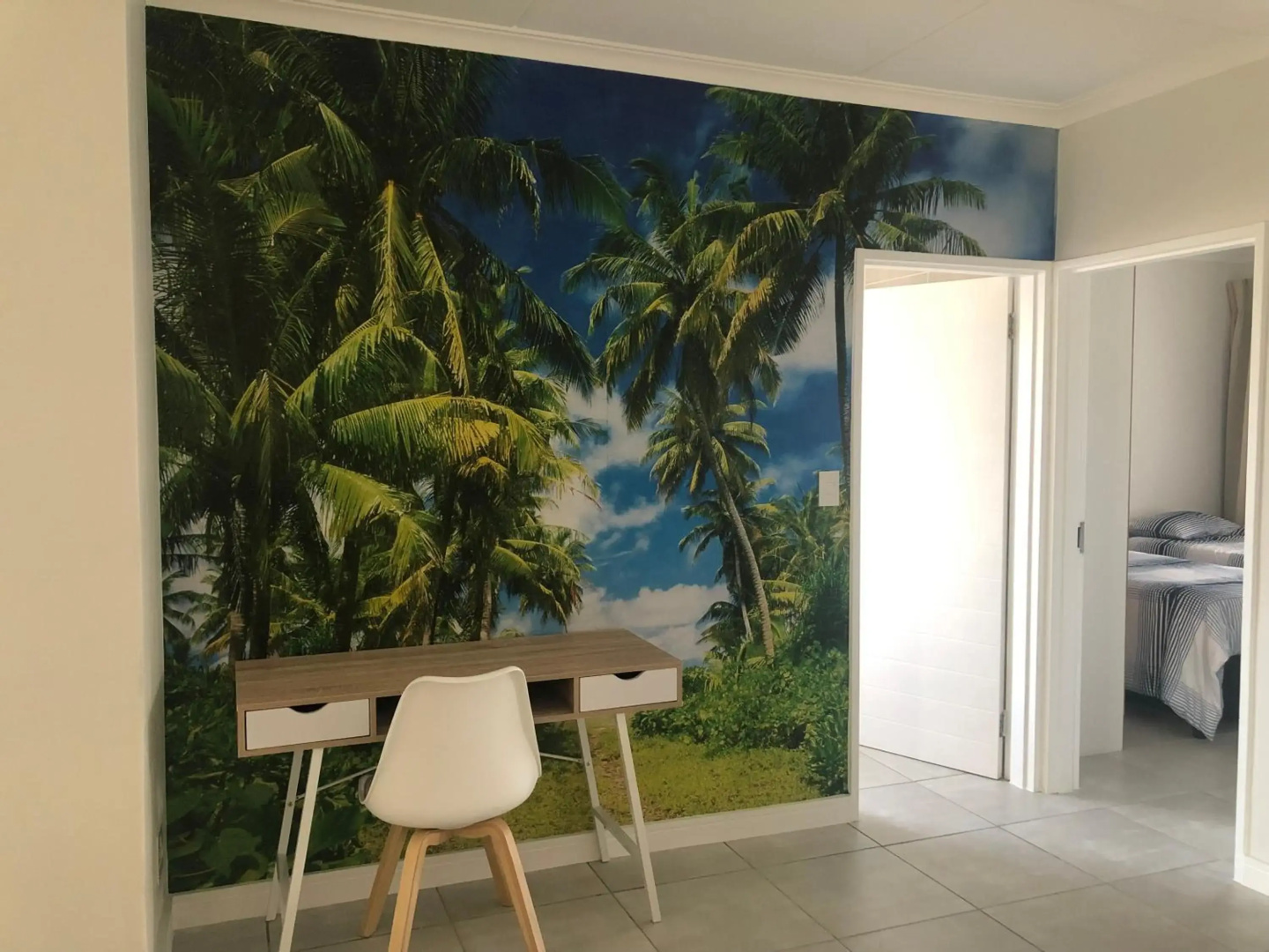 A Coastal/island experience at a Large 2 bed apartment at a Crystal Lagoon Estate.
