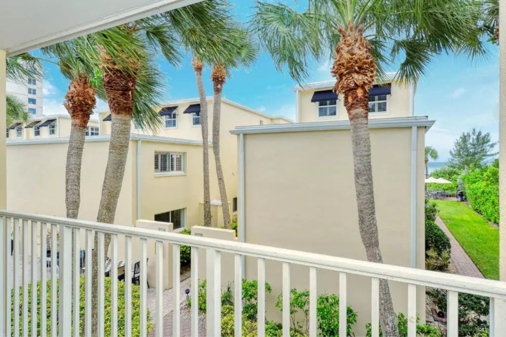 LaPlaya 202E Catch the gentle Gulf breezes on your private balcony beneath the swaying palms