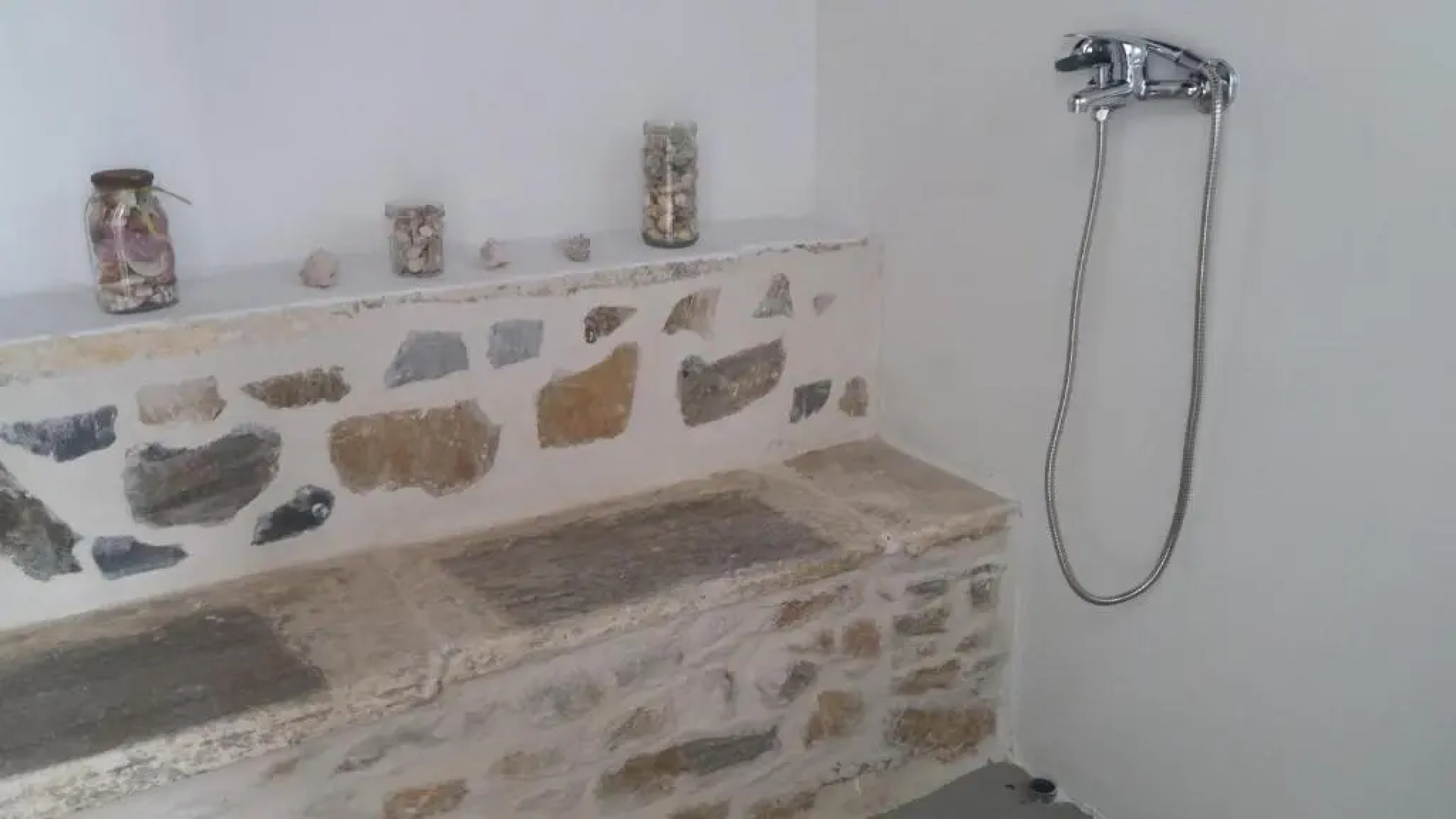 "Fasolas square house" is located 30 stairs up from the main road and it is in the old market "fasolas" and next to the museums