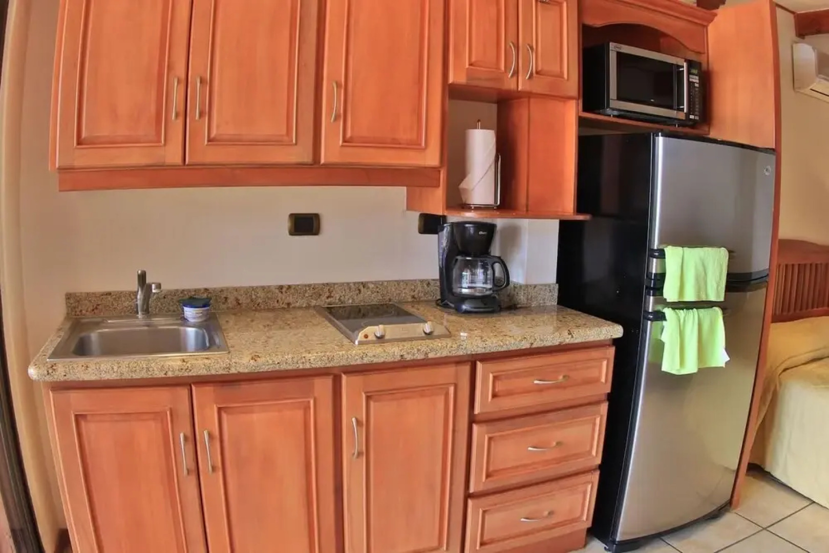 Hotel room-style ocean-view unit in Flamingo with pool