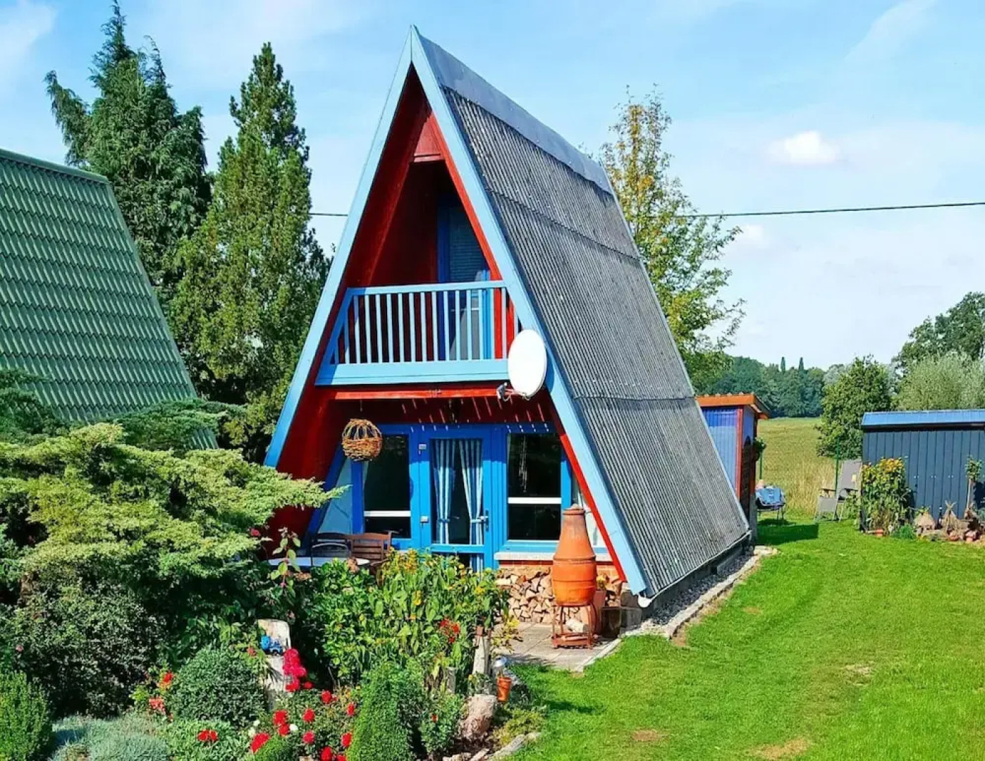 Roof House Near Dummer See With Rowing Boat