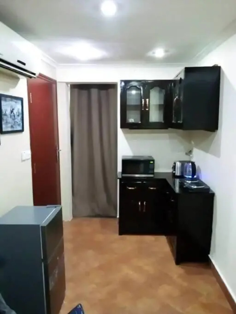 Mikocheni Studio APartment with a car