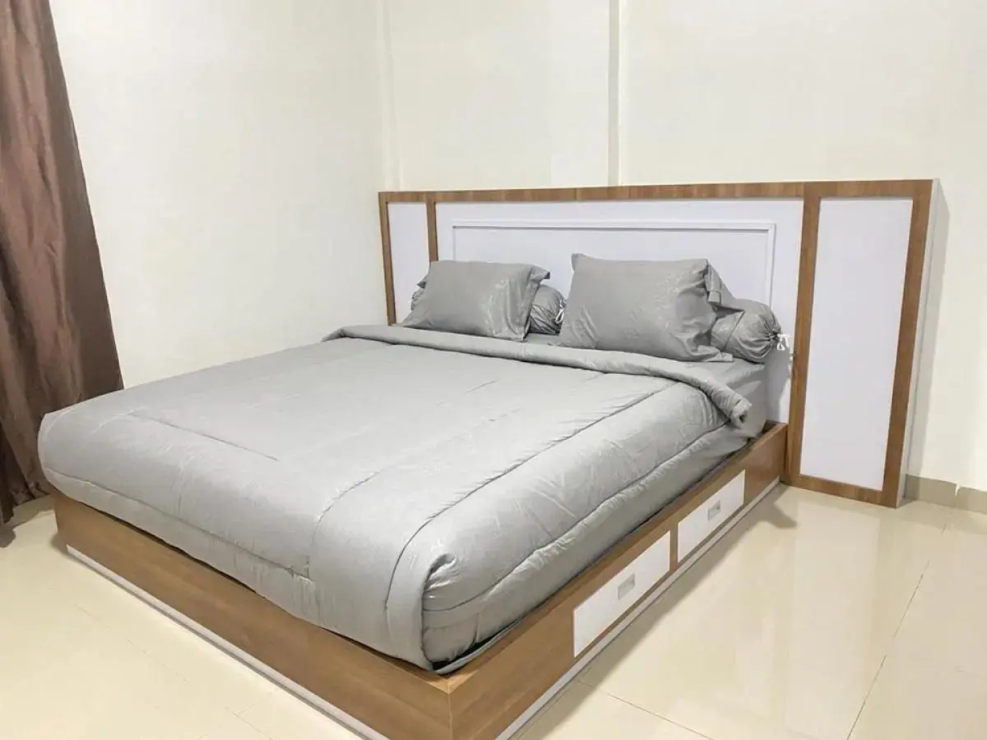 MJ Guest House Pusat Kota Malili Mitra RedDoorz