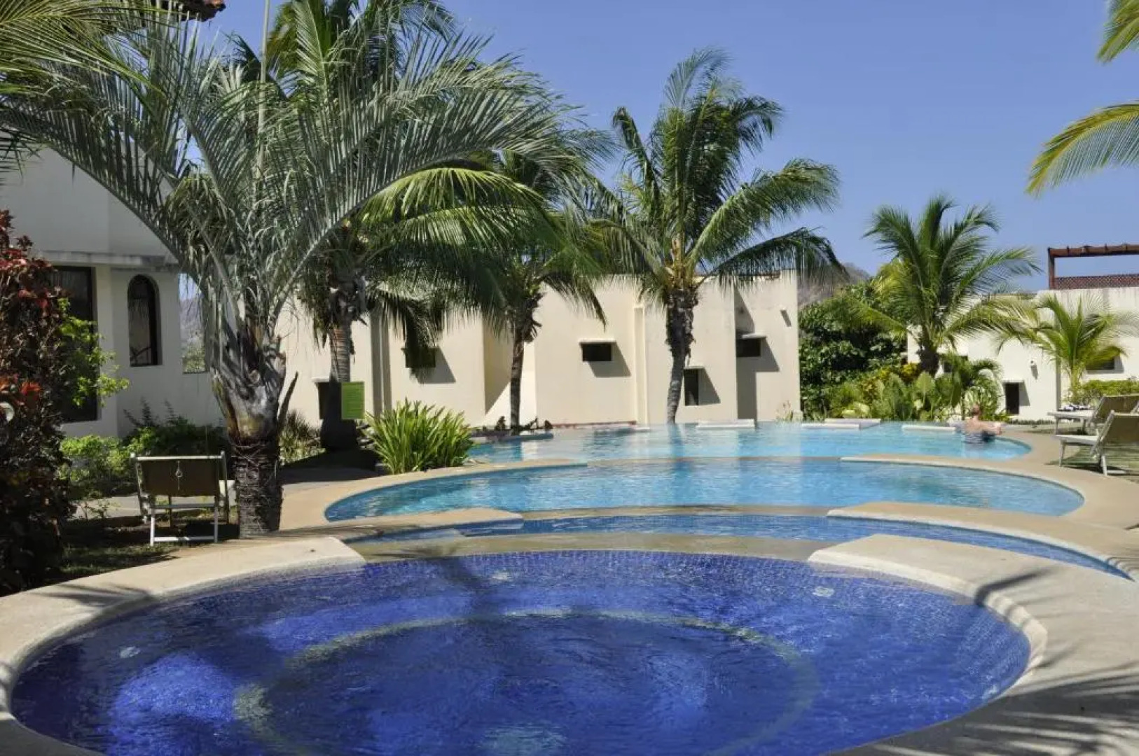 Tropical Gardens - Suites and Apartments