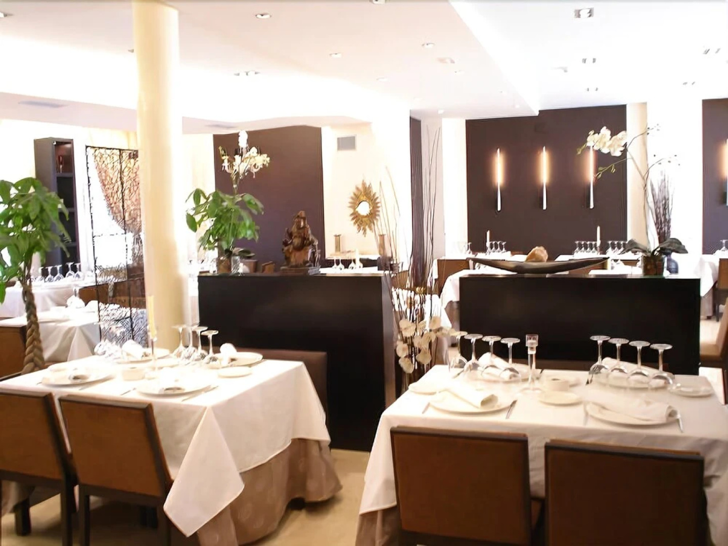 Hotel Asador H.M. Versus