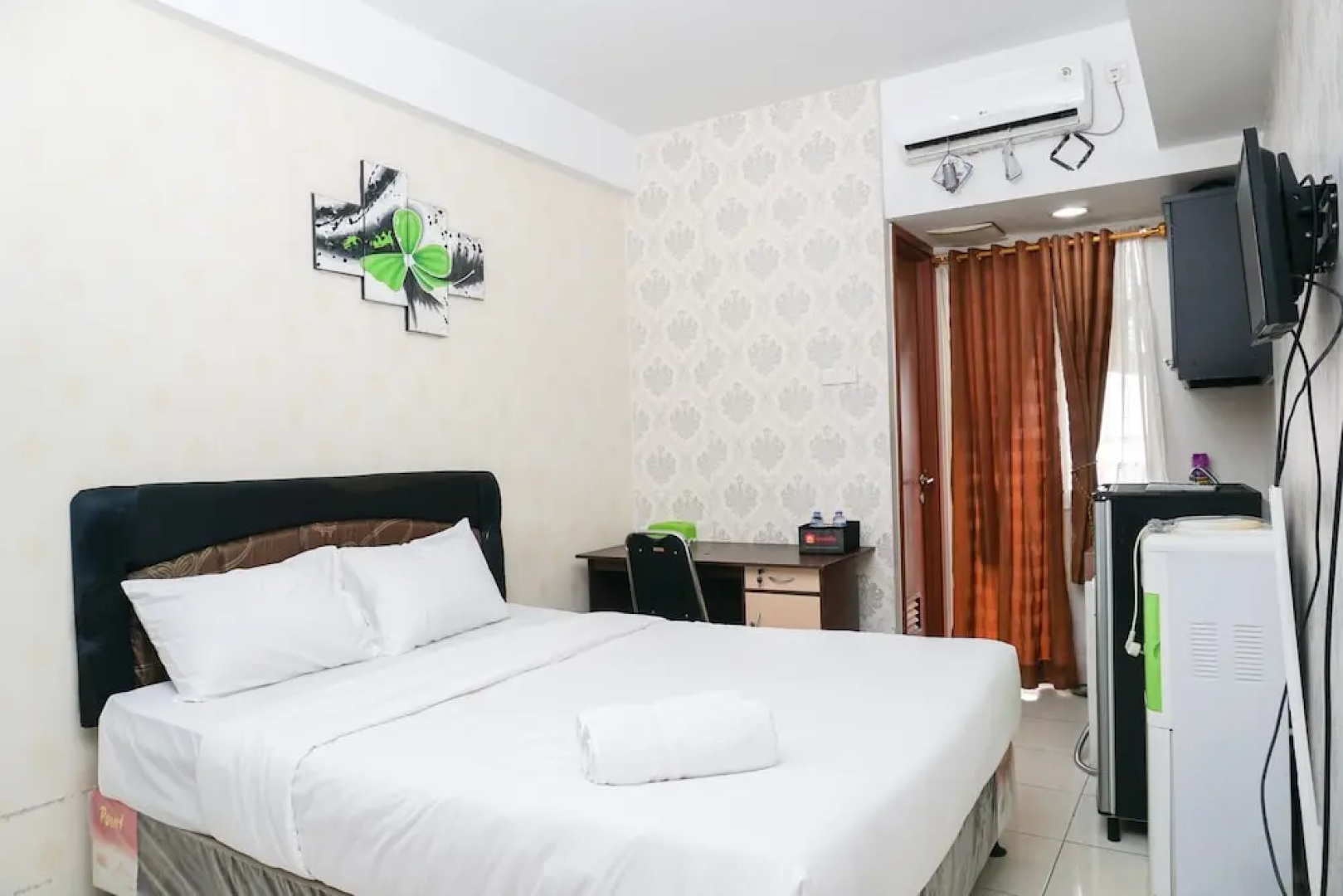 Elegant Design Studio Apartment at Margonda Residence 4 By Travelio