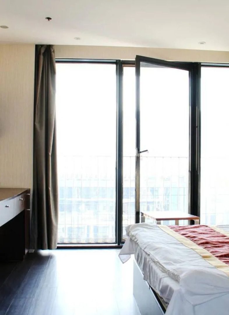 Enji Apartment Hotel Bainianhui - Dalian