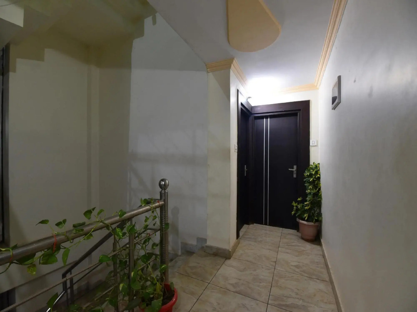 OYO 28555 Sandalee Comforts