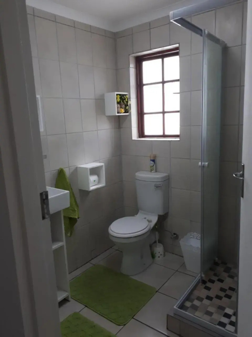 Cozy 4 bedroom house enclosed by sea and mountain.