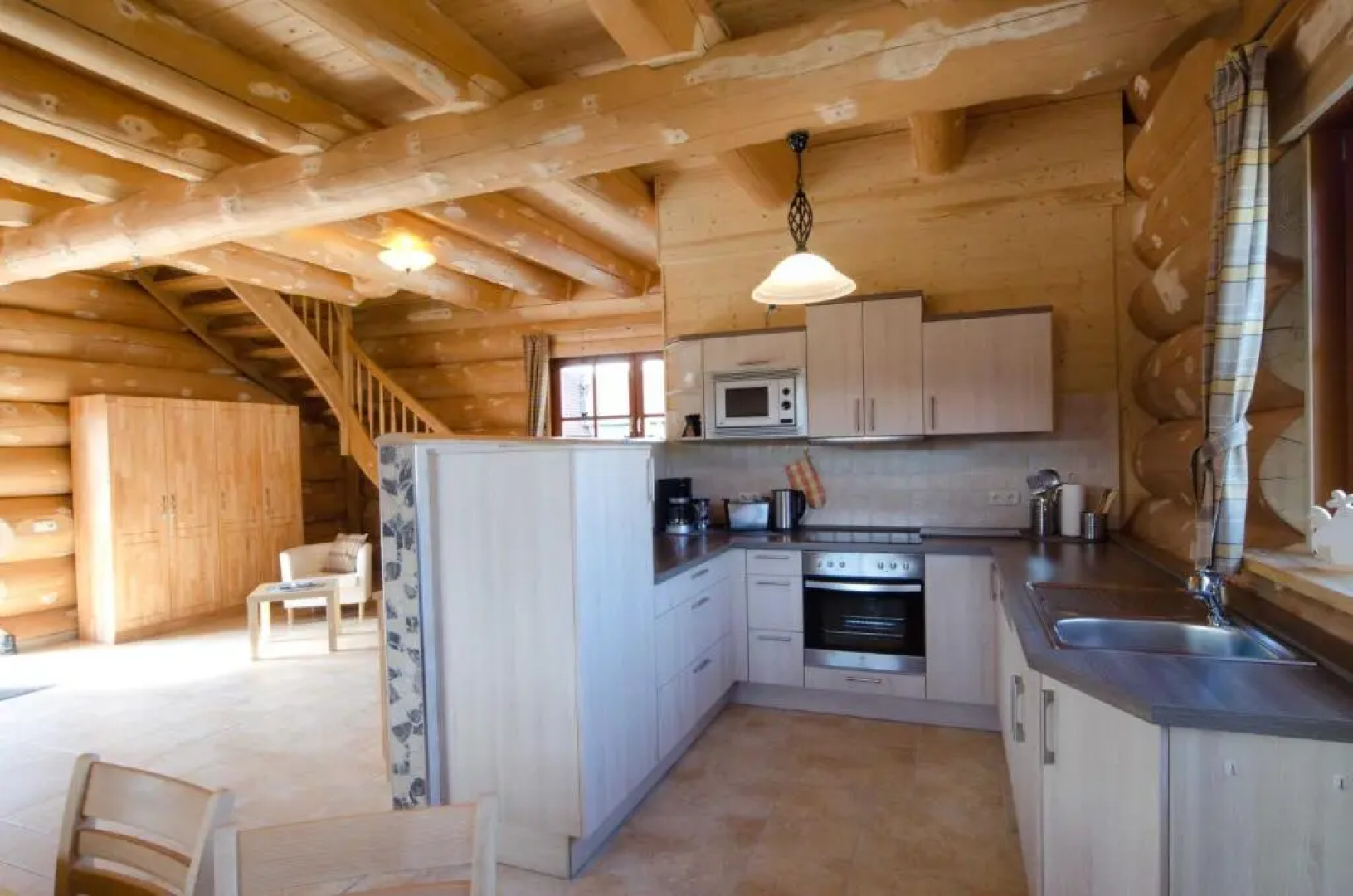 Heumann_s Blockhaeuser am Wald