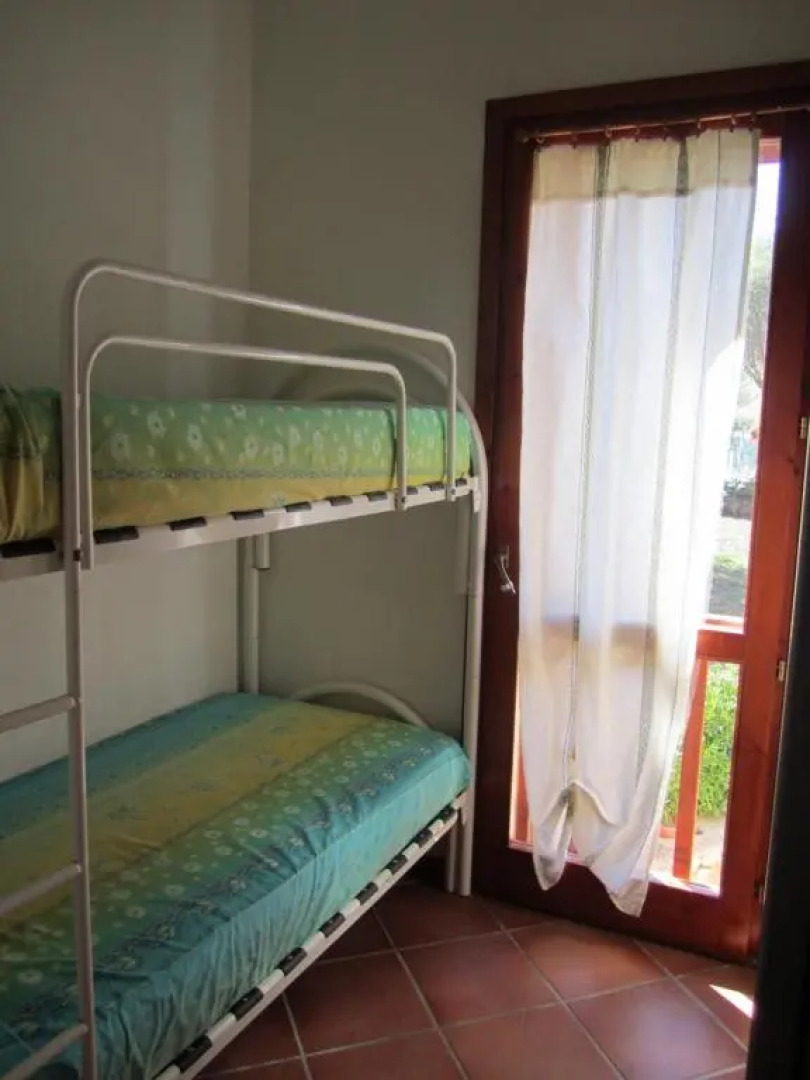 casa rosa nel residence mirice con piscina ,wifi,condizionatore - vicino al mare