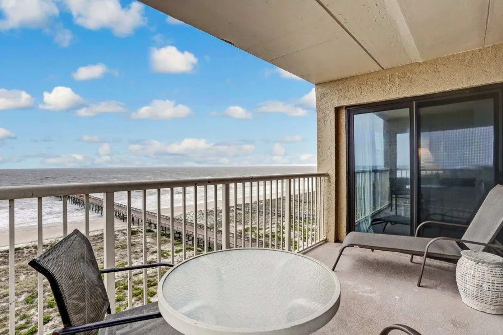 North End Corner Unit with View of the Ocean and Miles of Sandy Beach by RedAwning