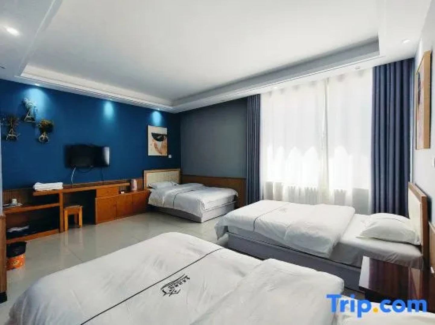 Wulanbutong Jincaodi Inn